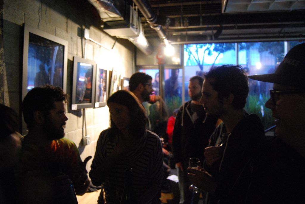 Adair and Tim chatting with attendees.