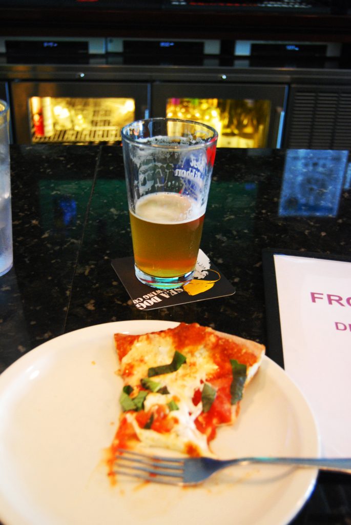 Deciduous' Foreward with a Front Row margherita pizza.